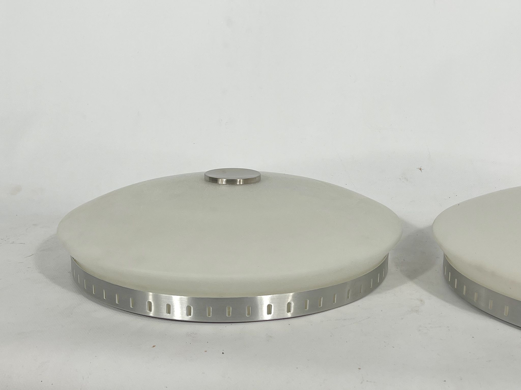 Stilux Milano, pair of round opaline glass ceiling lamps. 1960s