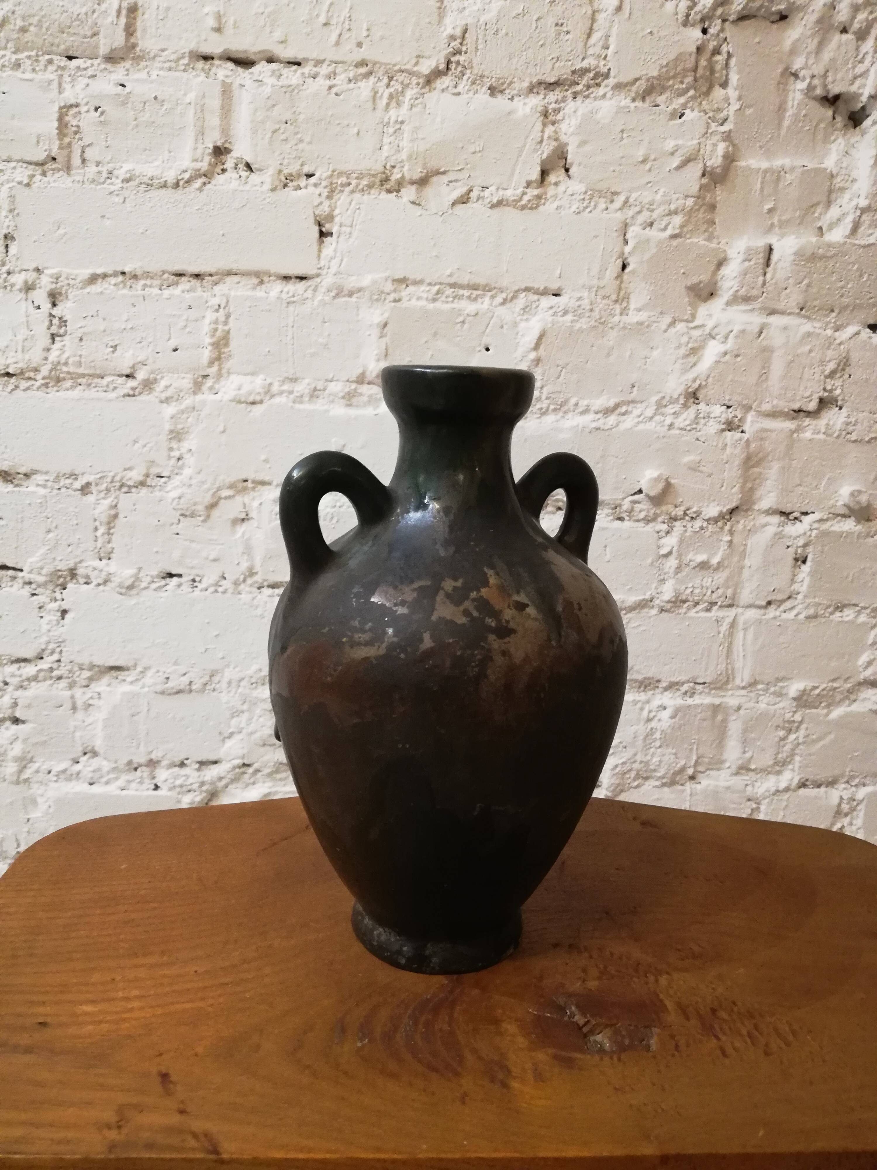 Old glazed terracotta vase