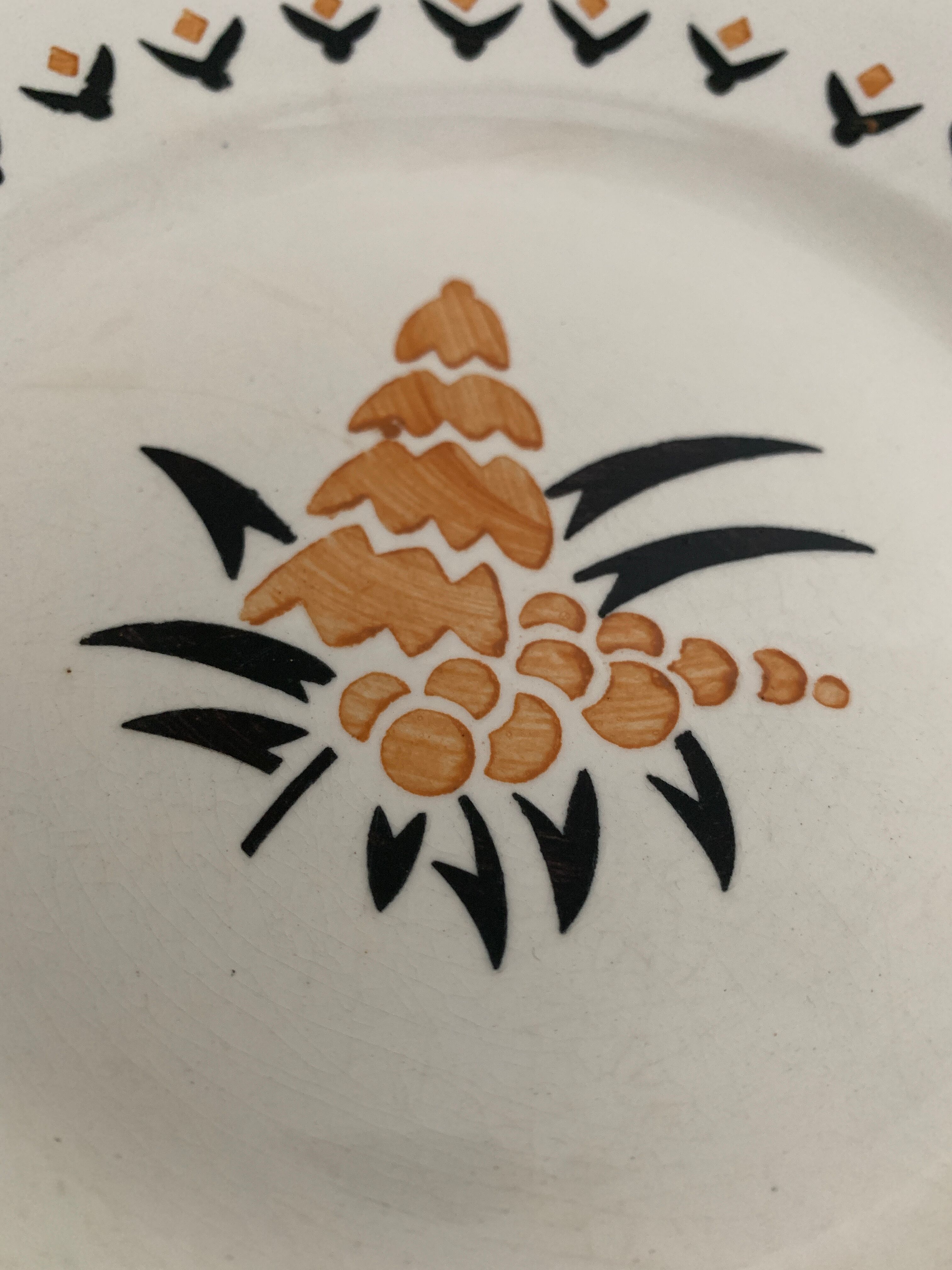 7 dessert plates and one Longwy dish
