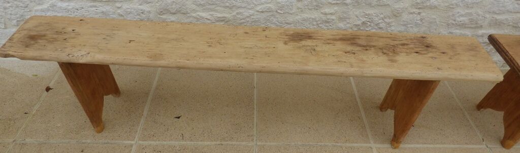 Two benches in their solid wood patinas