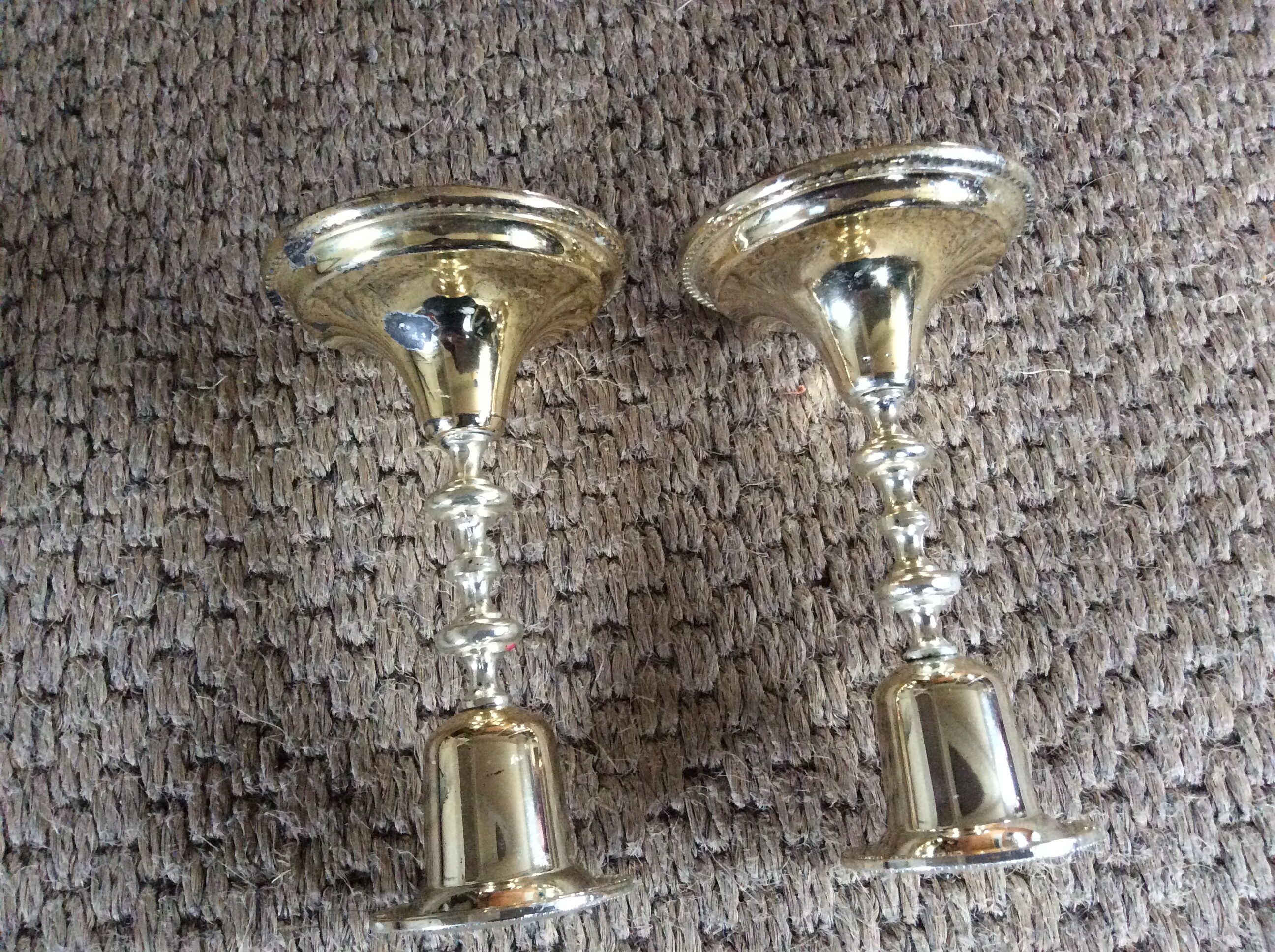 Pair of gold metal candle holders