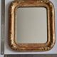 Miroir Louis-Philippe en bois et stuc doré à décor floral, XIXe, 43 x 38 cm