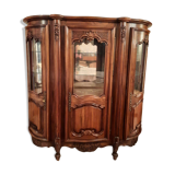 Argentier trois portes dont 2 arrondies, style régence.