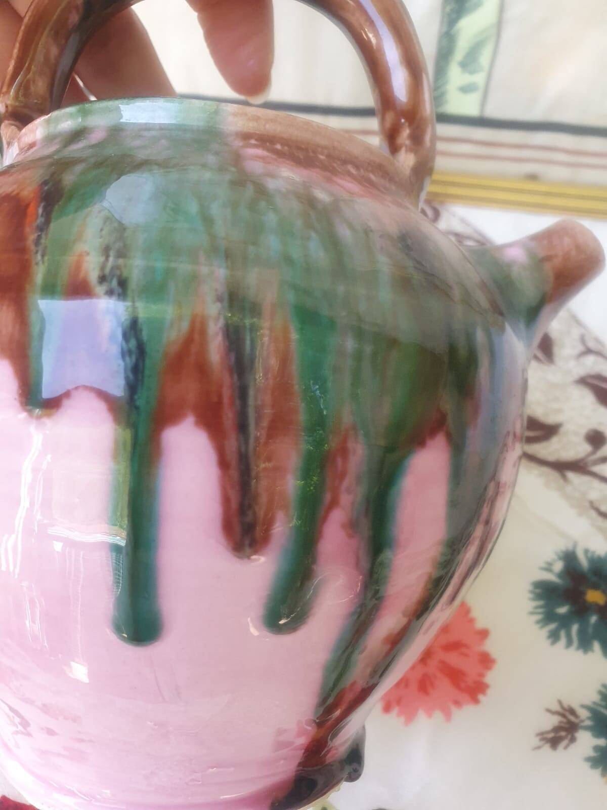 Jug pitcher Provençal earthenware glazed with pink and green glaze.