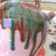 Jug pitcher Provençal earthenware glazed with pink and green glaze.