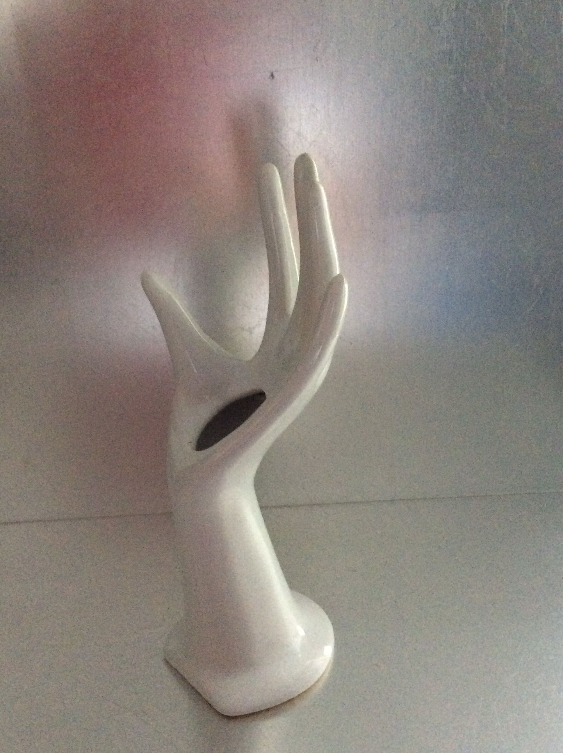 Vintage hand in white ceramic