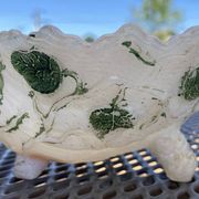 Shell-shaped trinket dish in white opaline with green foliage decoration