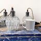 Set of three vintage electric chiseled glass walking lamps