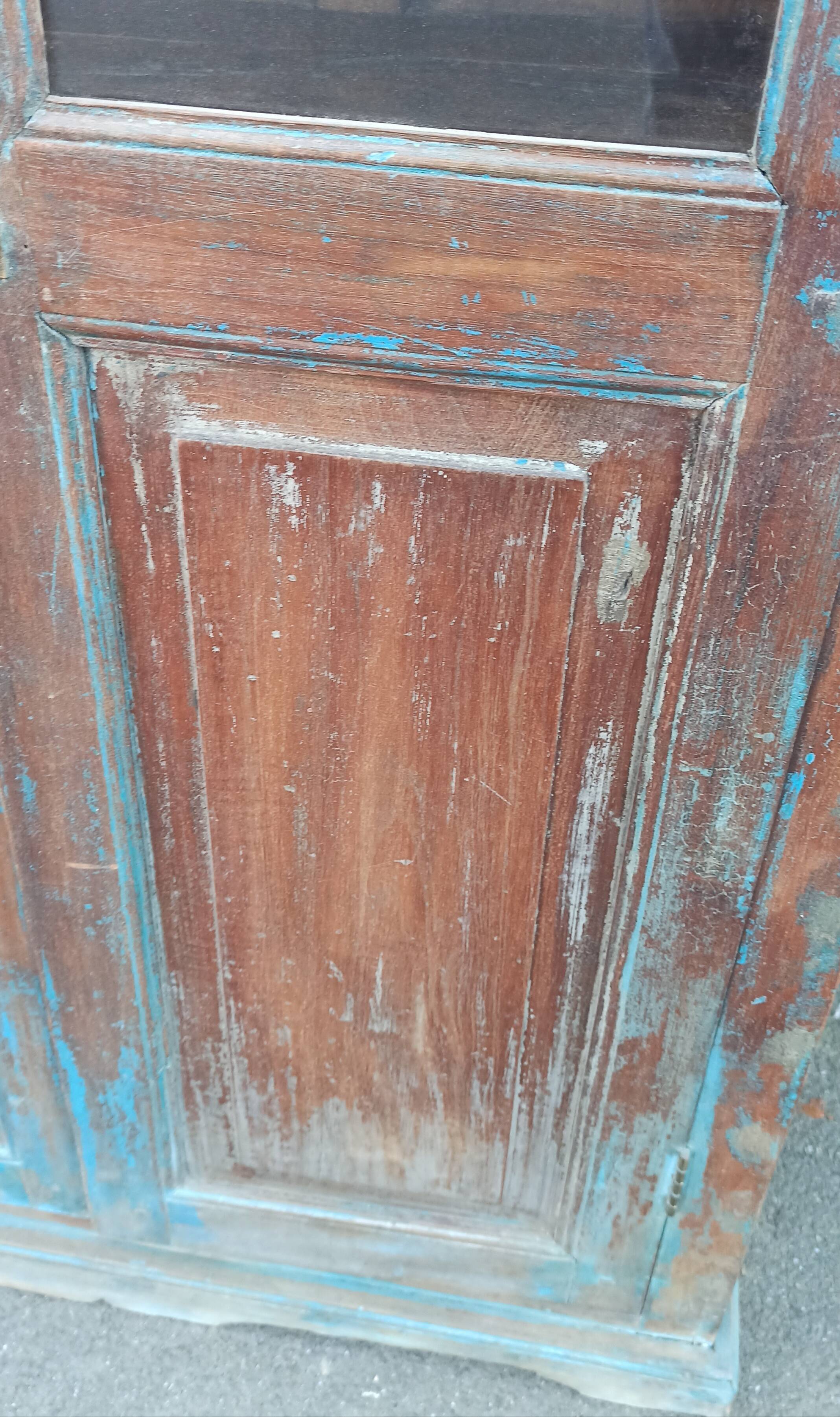Old glazed wooden cabinet with beautiful patina