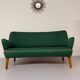Old vintage green cocktail bean sofa from the 50s