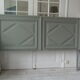 Headboard made with an old walnut door, re-enchanted in gray green waxed finish,