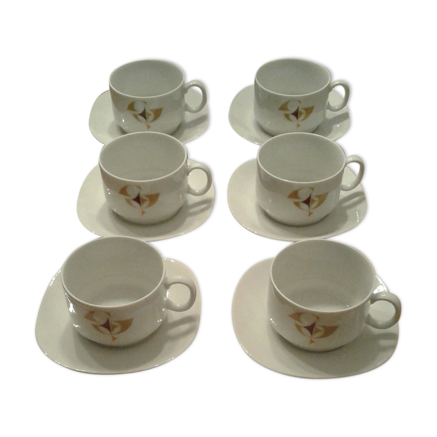 Set consisting of 7 cups and 7 sub cups. Porcelain. Vintage