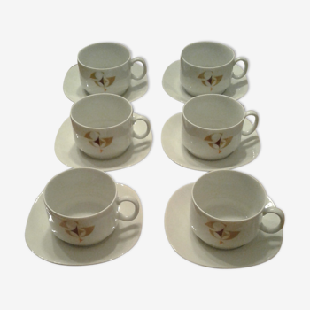 Set consisting of 7 cups and 7 sub cups. Porcelain. Vintage
