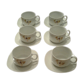 Set composé  de 7 tasses et 7 sous tasses. Porcelaine. .vintage