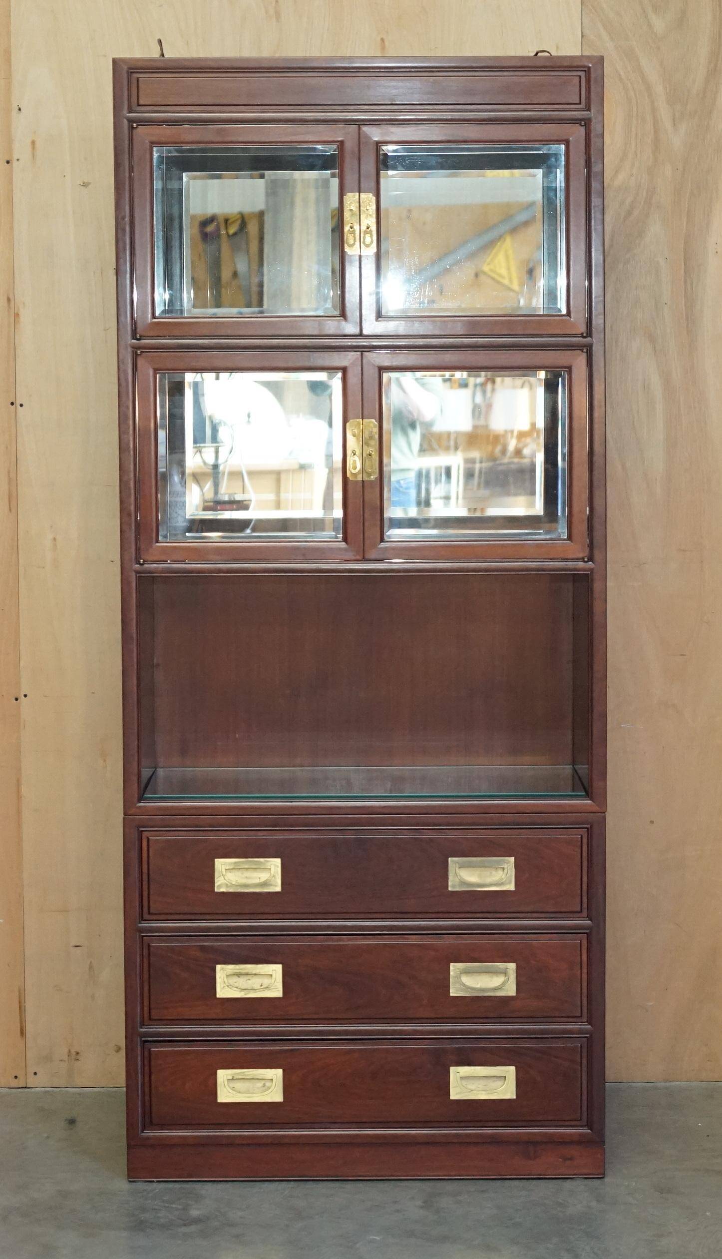 Set of three vintage hardwood military-style bookshelves.