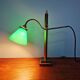 Bronze desk lamp with a green opaline conical shade, 1920.