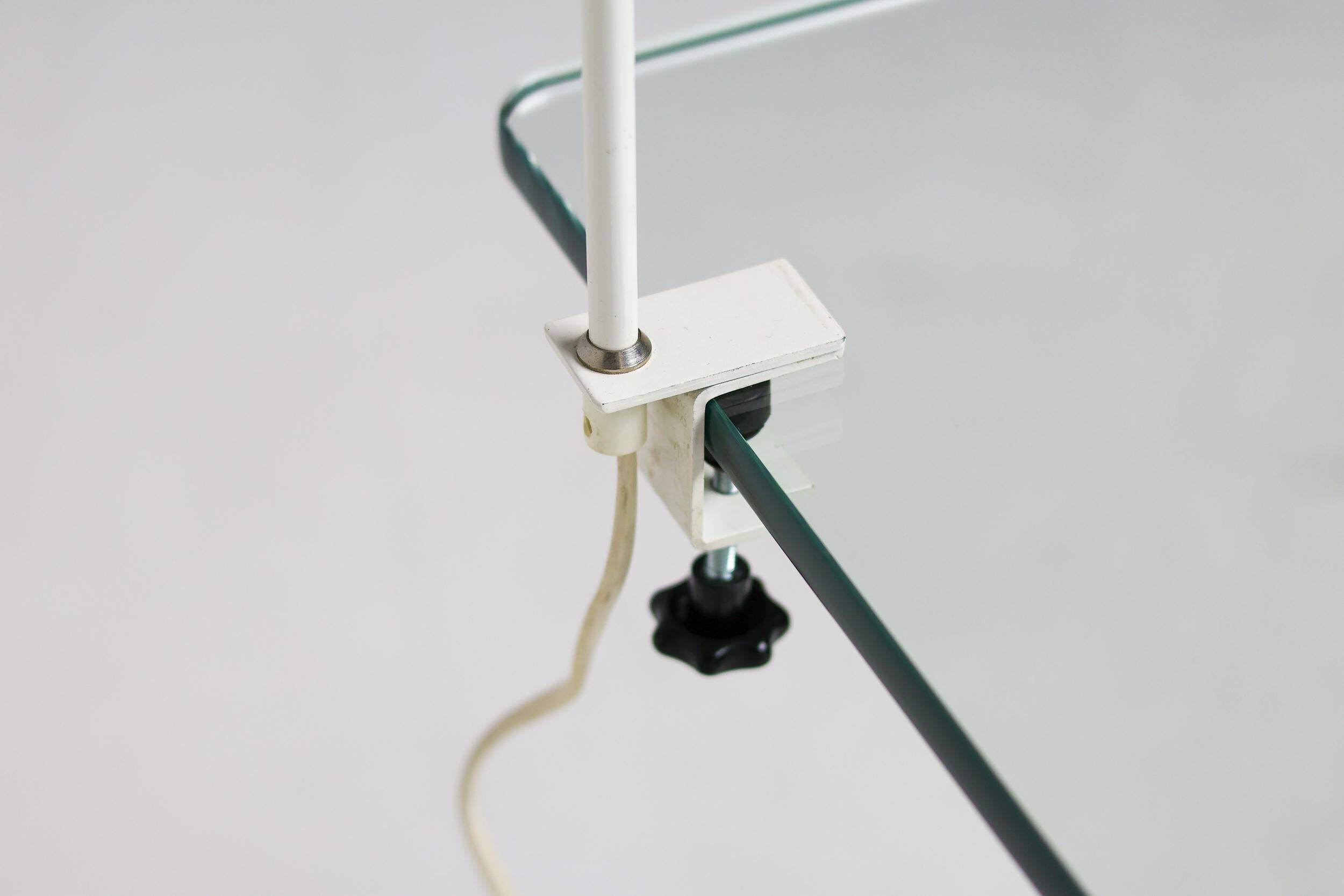 Modern Bauhaus style lamps in white, ideal for the library or study.