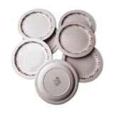 Set of 7 Betty Longwy model plates with floral decoration