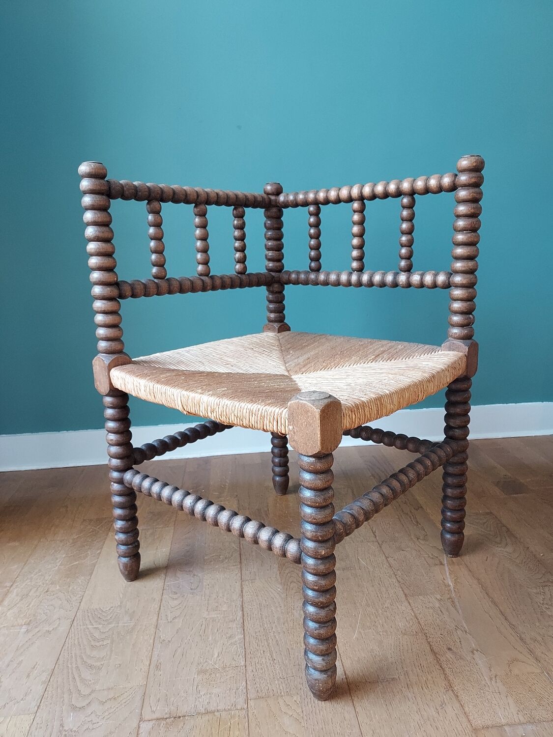 Corner armchair in turned wood