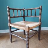 Corner armchair in turned wood