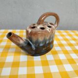 Alpho earthenware spikes in the shape of a watering can