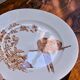 Large round dish from around 1870 signed Longwy with birds in sepia ironstone.
