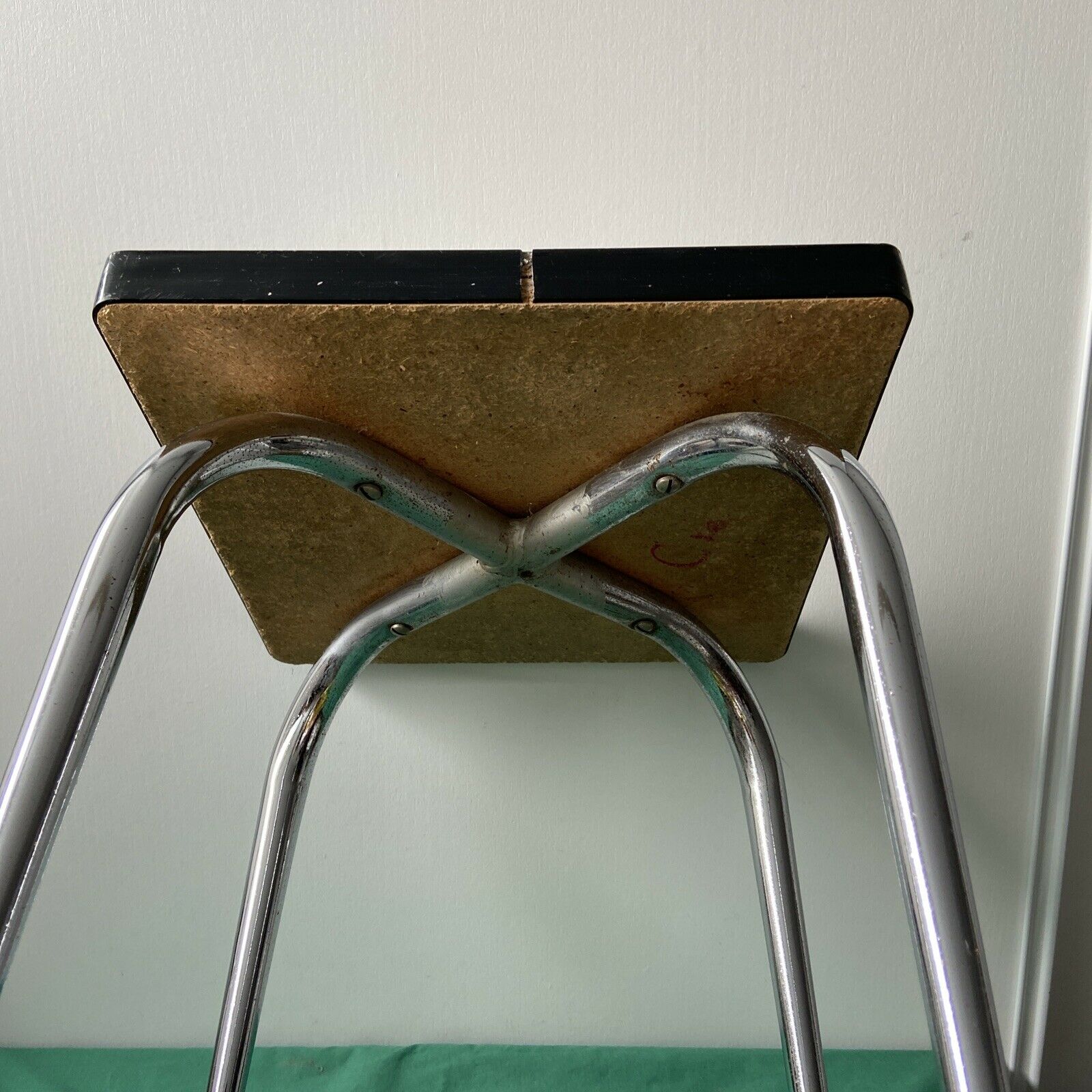 White stool in formica and metal