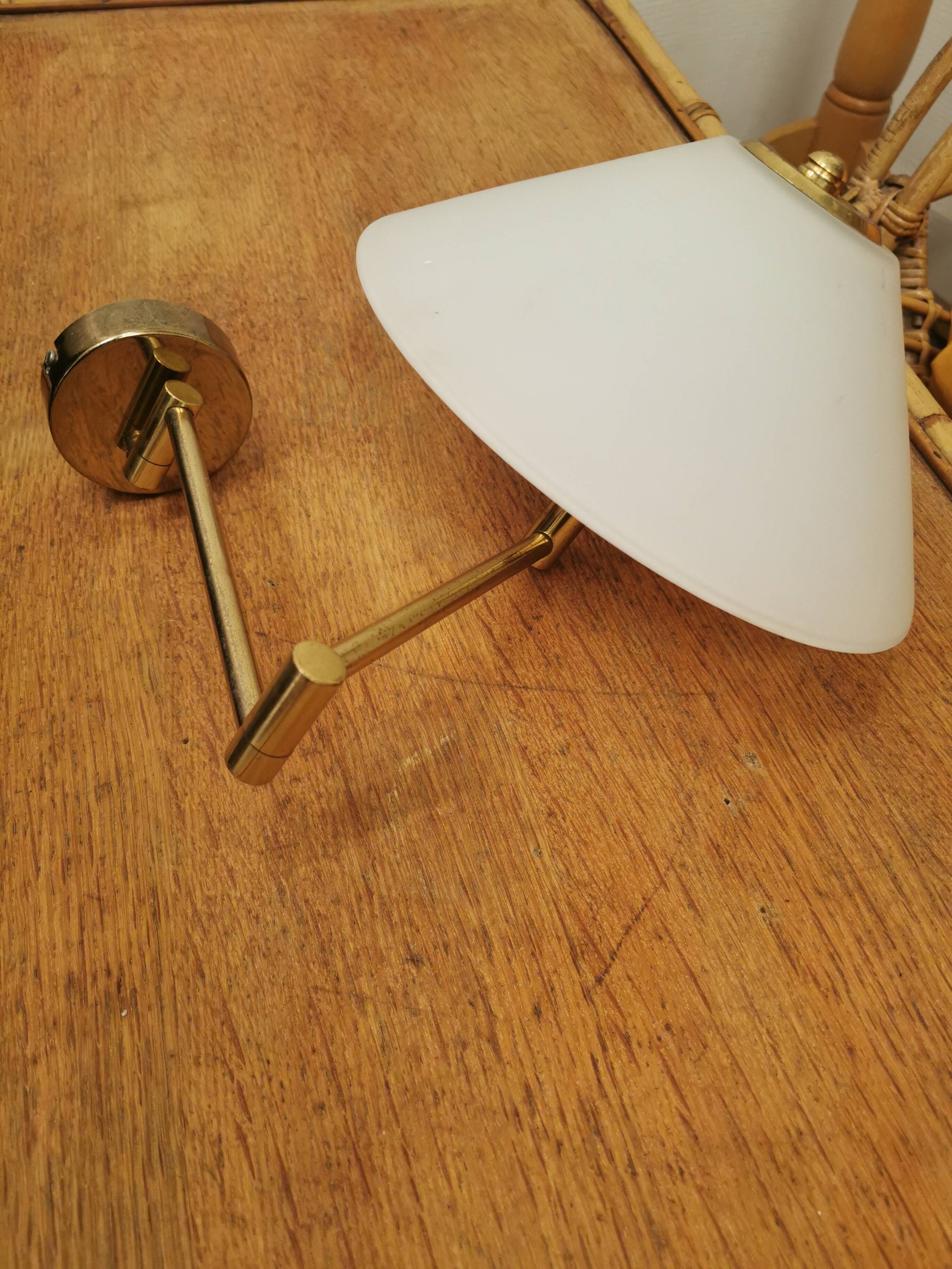 Brass wall lamp with vintage articulated arm, glass and brass shade