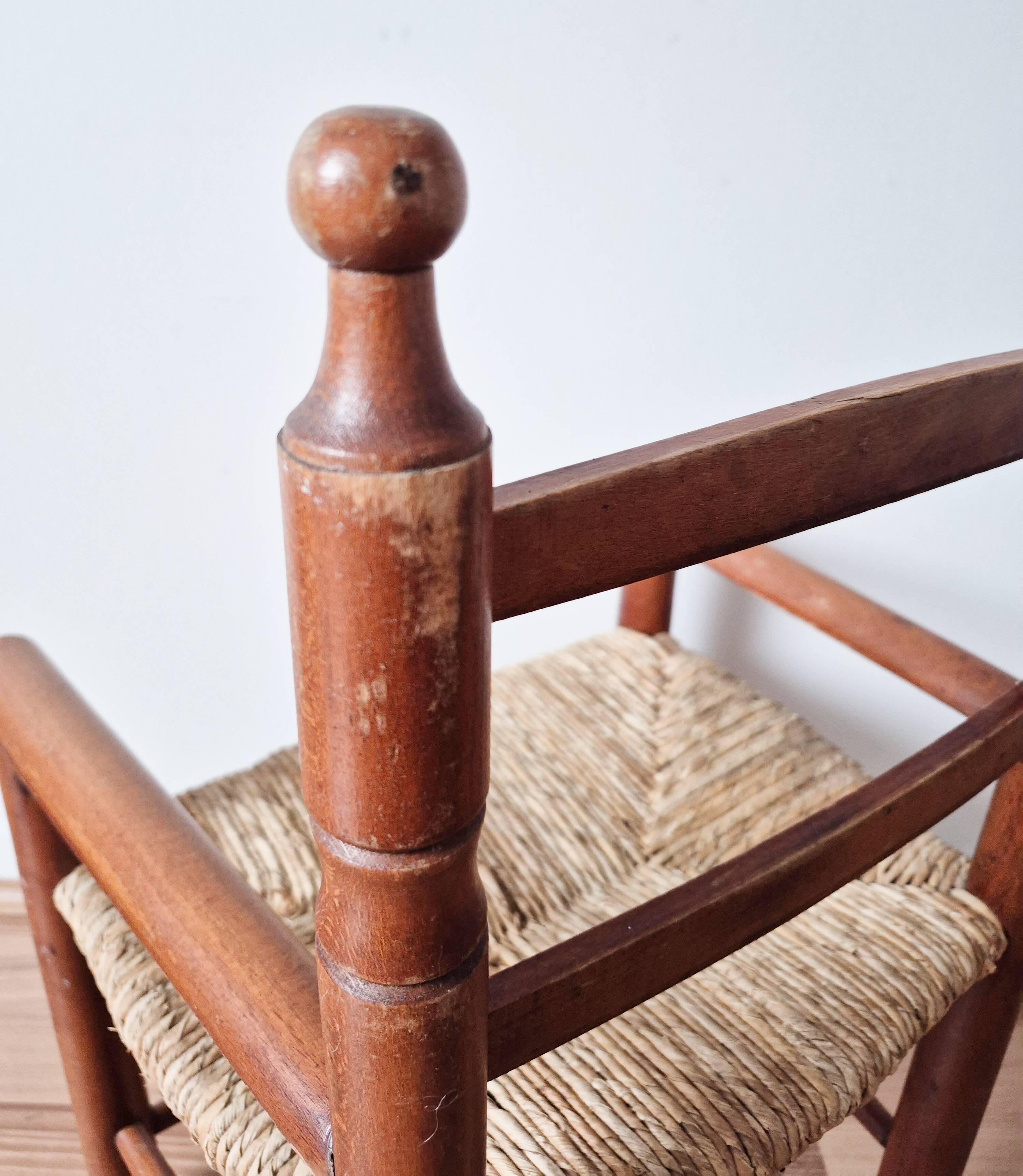 Vintage wooden and straw children's armchair