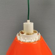 An orange pendant lamp made from hard-pressed ABS plastic. Denmark 1970s