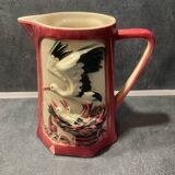 Set of stork pitchers