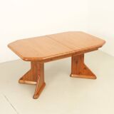 Large extendable Danish dining table in solid pine, 1970s.