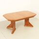 Large extendable Danish dining table in solid pine, 1970s.