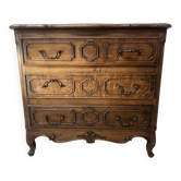 Regency style chest of drawers in carved oak, 20th century.