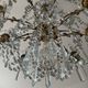 Grand chandelier in Louis XV style with crystal pendants.