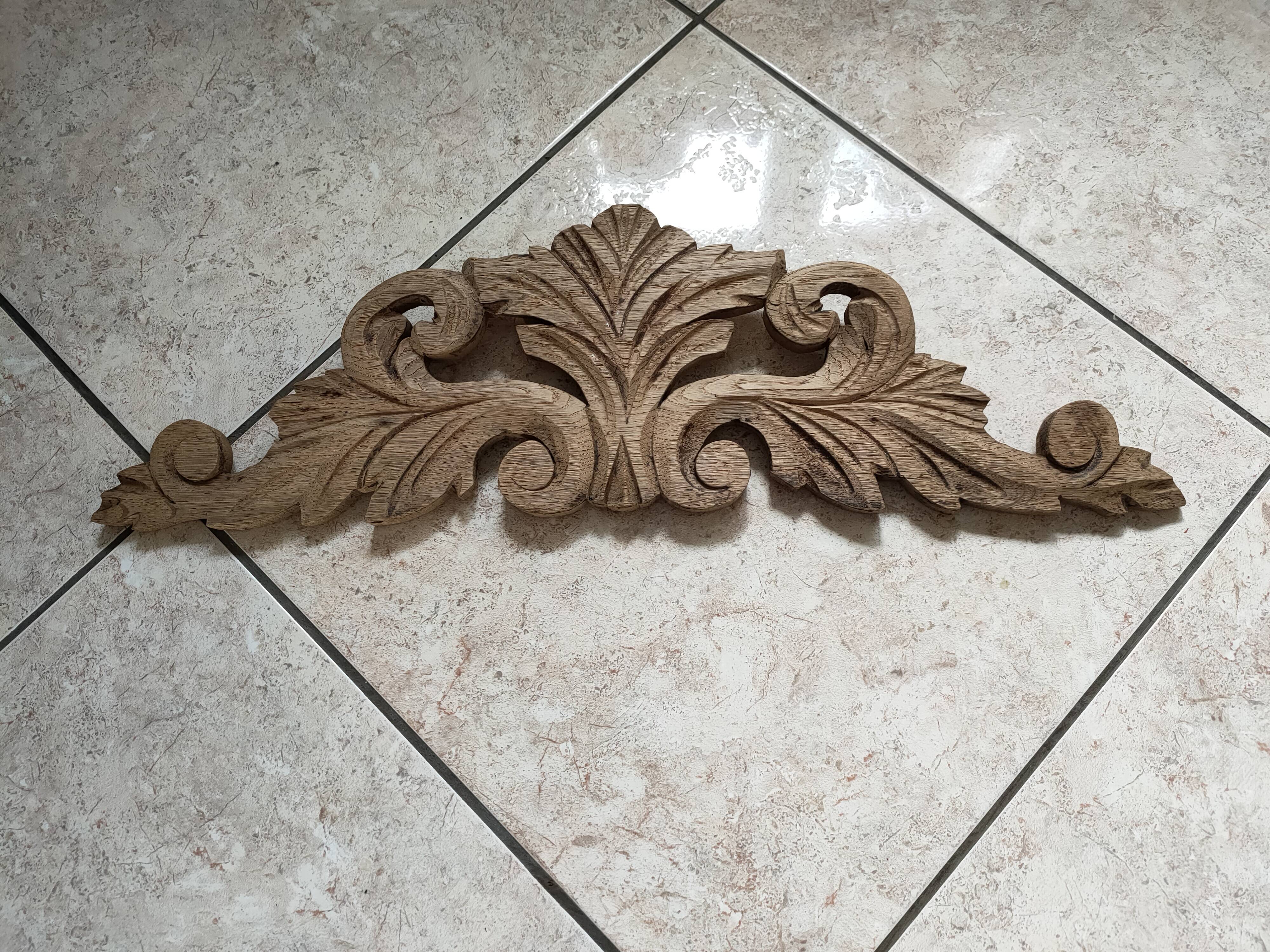 Old pediment in cut wood