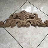 Old pediment in cut wood