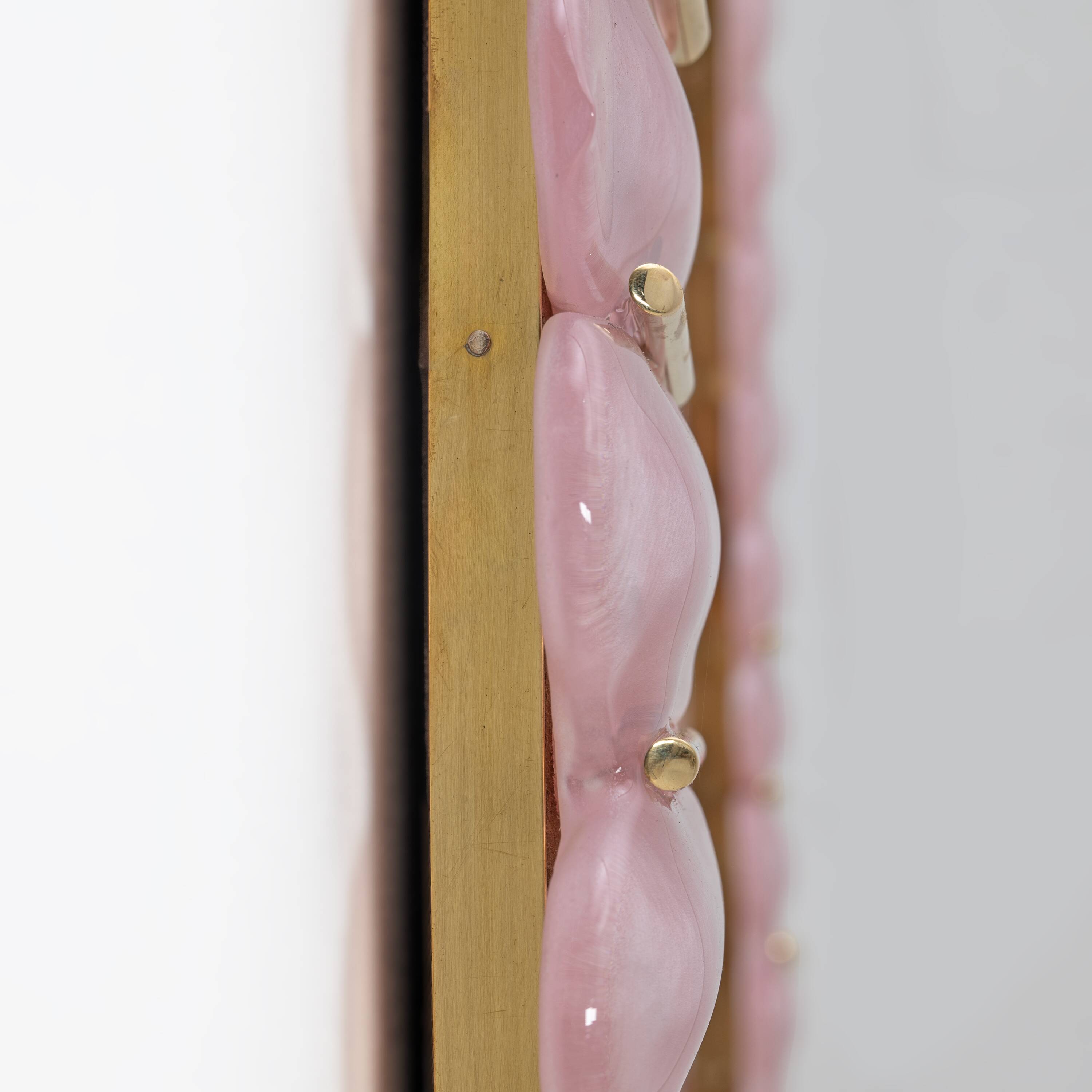 Italian oval mirror in brass and pink blown Murano glass
