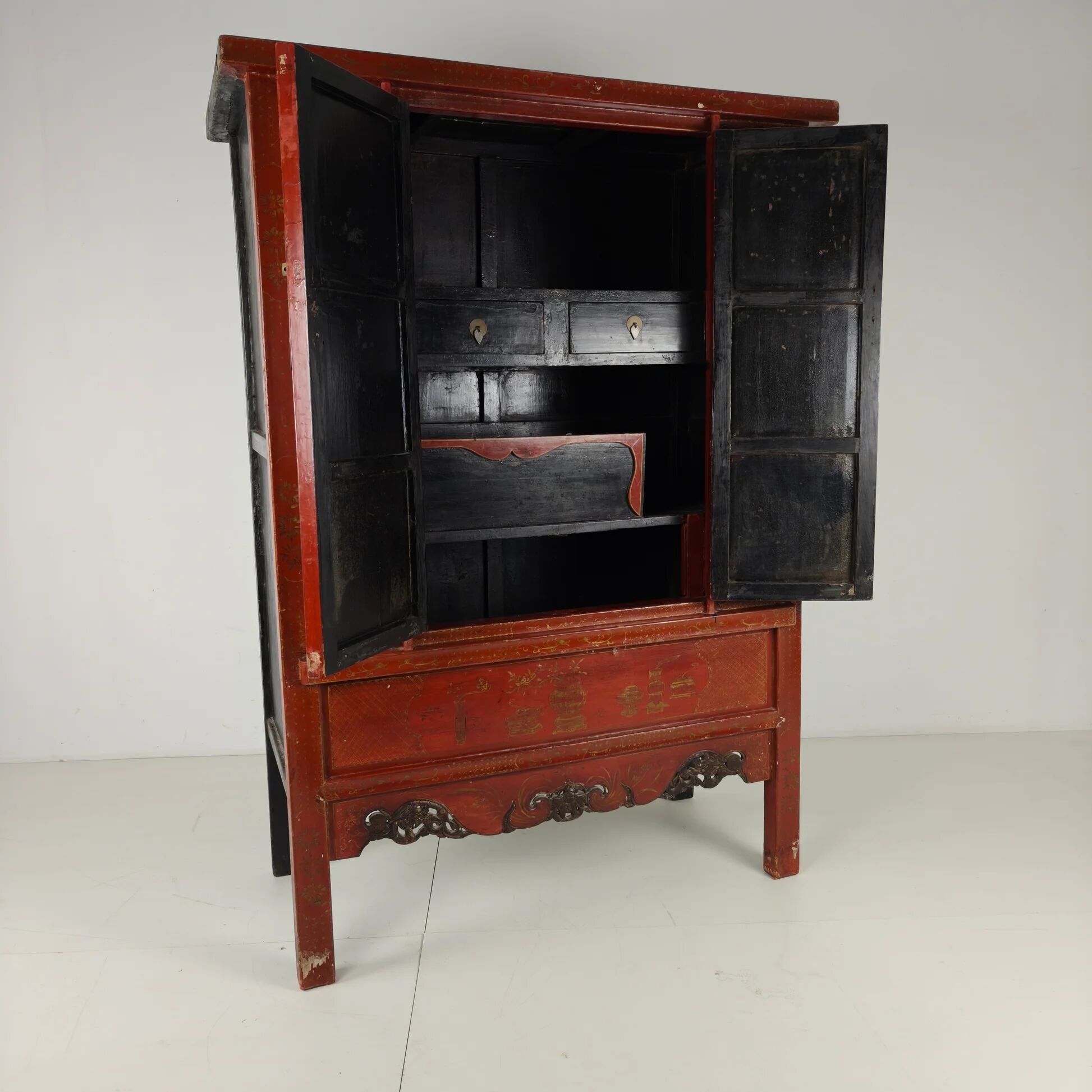 Antique Chinese red lacquer cabinet, late 19th / early 20th century.