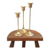Trio of brass candlesticks