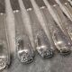 12 silver-plated dessert knives by Platil, rocaille style