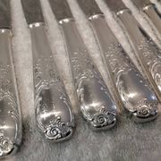 12 silver-plated dessert knives by Platil, rocaille style