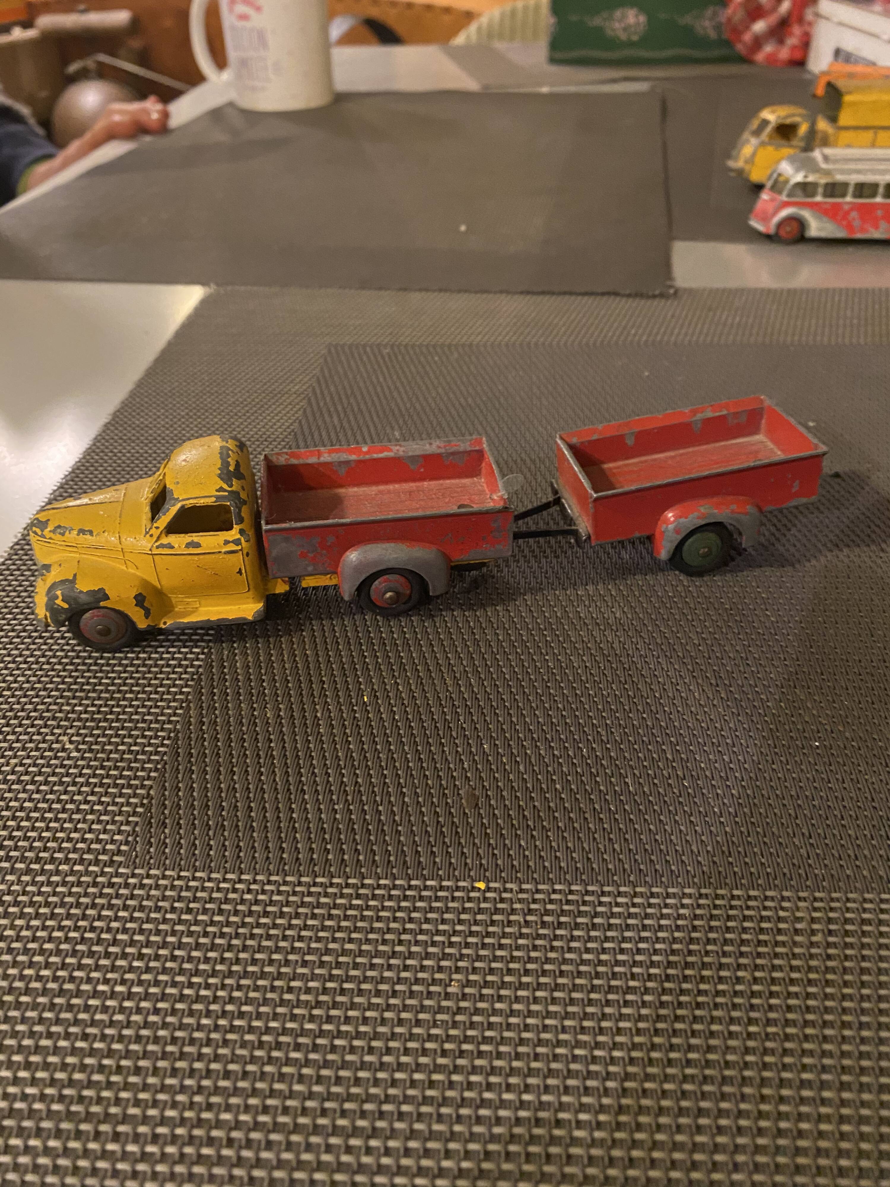 Dinky Toys dump truck and red trailer