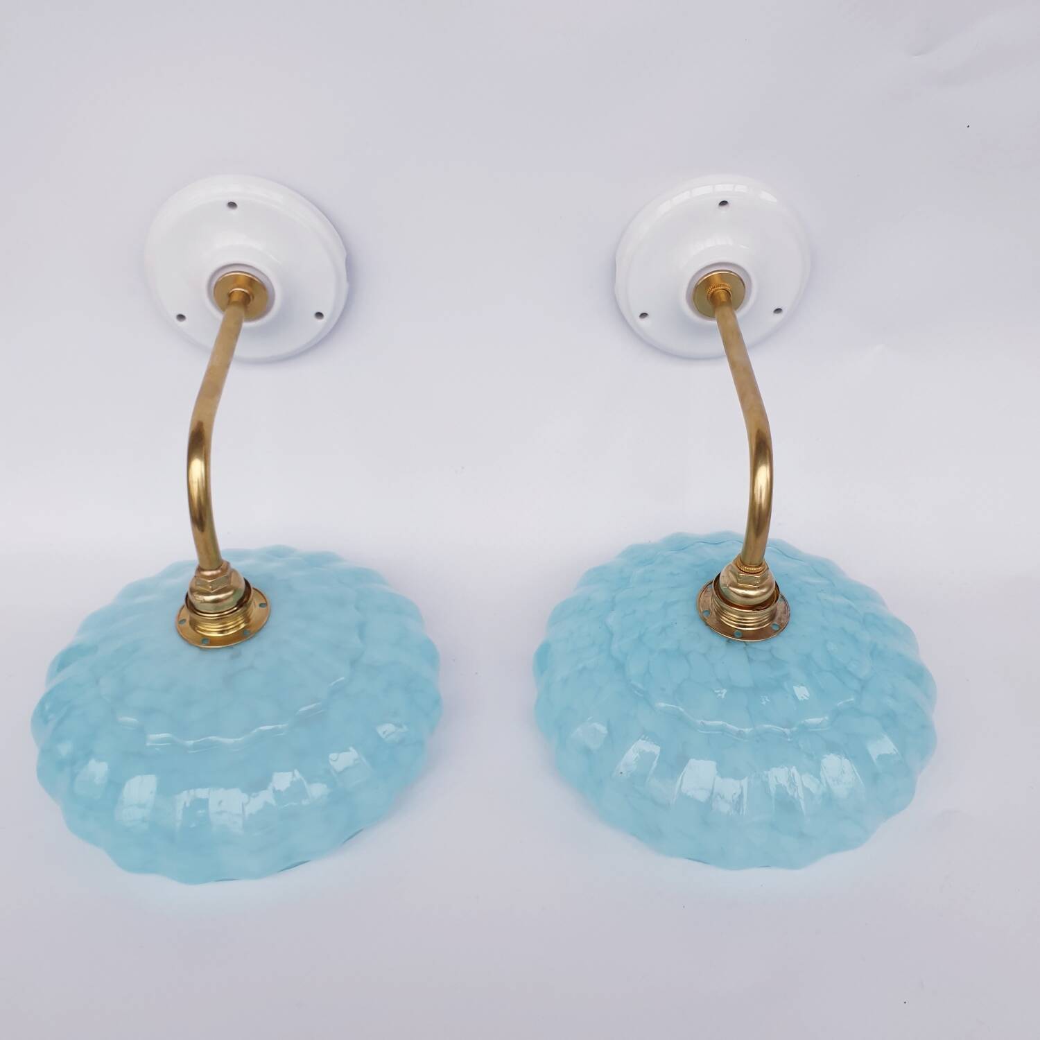 Swan neck wall lights and Clichy glass