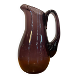 Plum colored glass pitcher