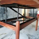 Vintage coffee table with Scandinavian rise and fall system in teak