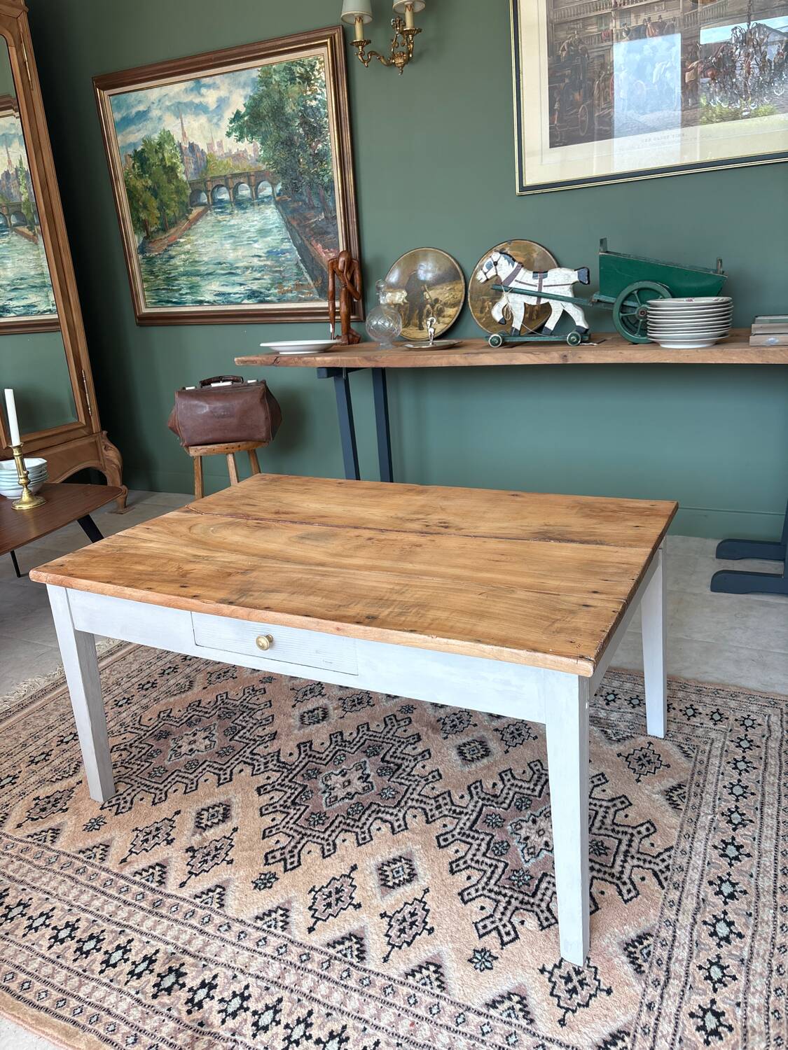 Coffee table with sandblasted top and painted legs.