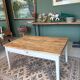 Coffee table with sandblasted top and painted legs.