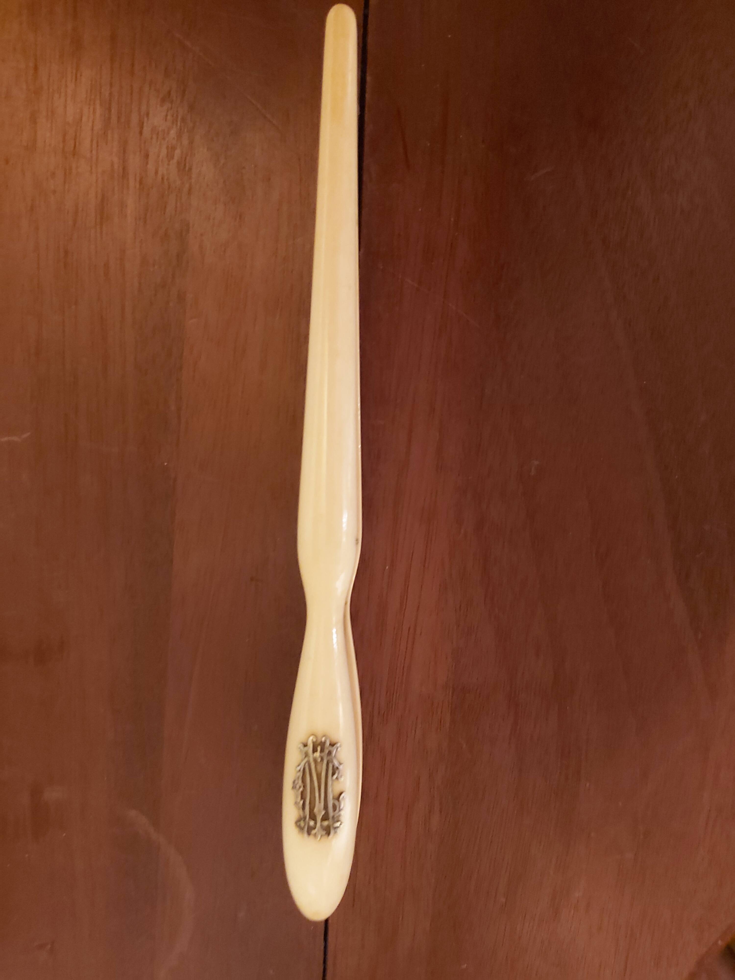 Ivory and silver glove clips