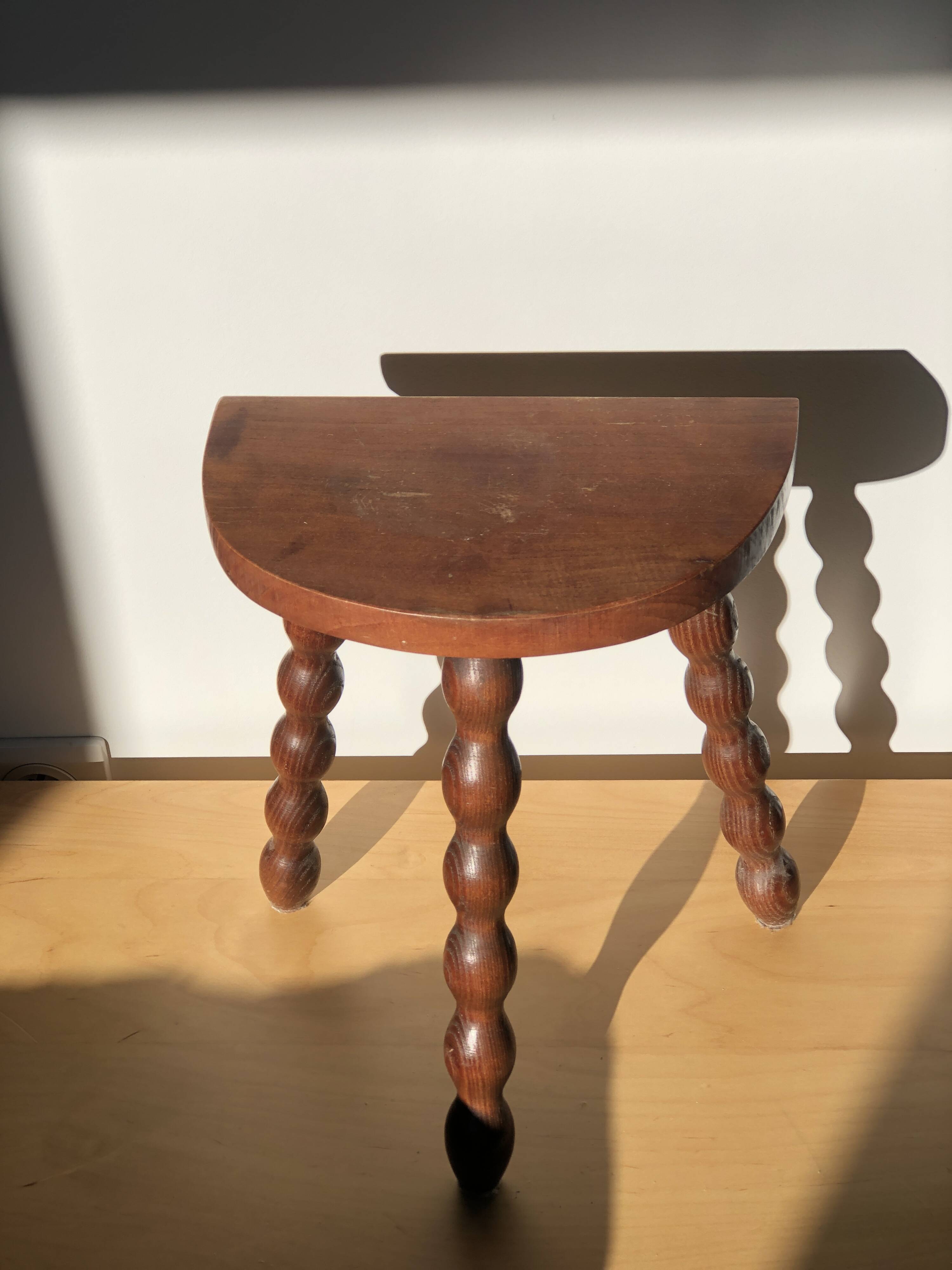 Turned wooden tripod stool